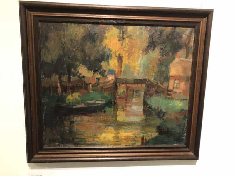 Piet Zwiers – Giethoorn in licht en kleur Schilderij van Piet Zwiers met brug en water in Giethoorn, warme kleuren en impressionistische stijl